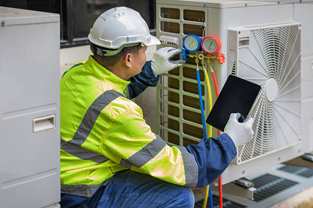 Professional Air Conditioning Repair technician working in New Douglas, IL
